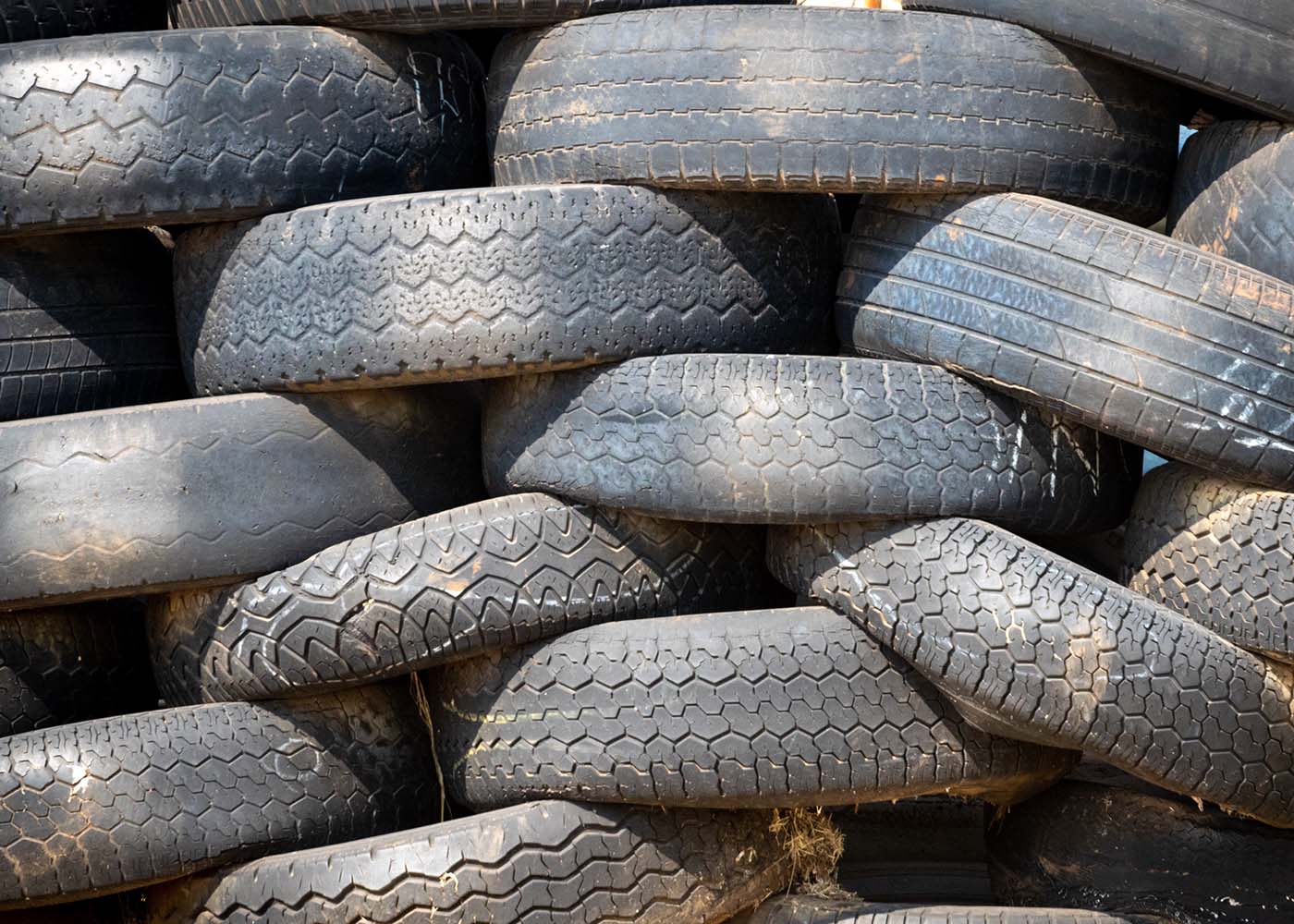 Image of a stack of tires in a landfill